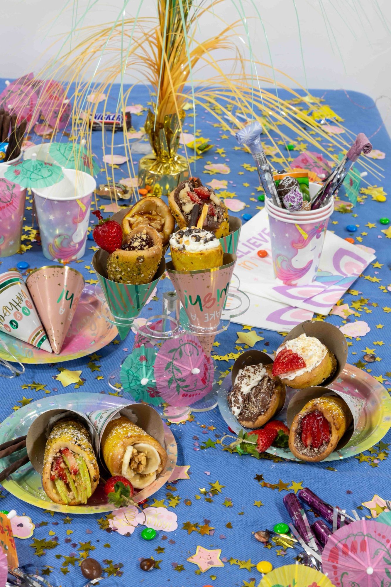 CookieKones with dessert fillings on a colorful party table