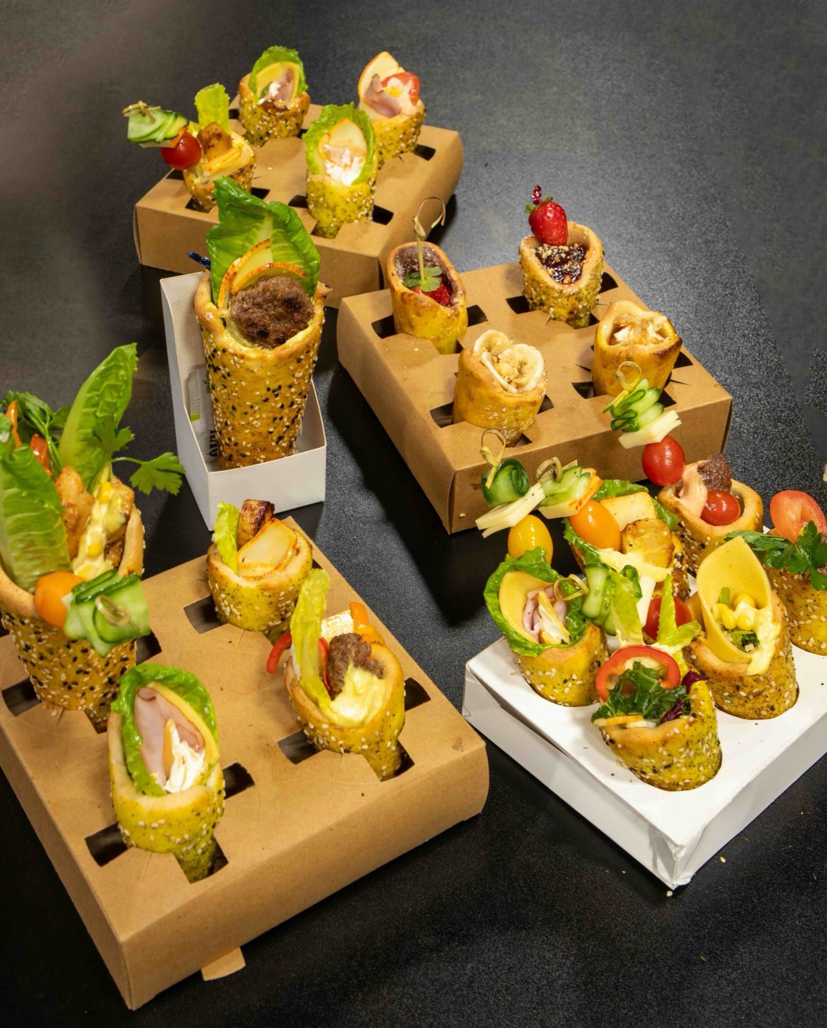 Mini BreadKones packed in kraft cone trays for delivery and grab-and-go