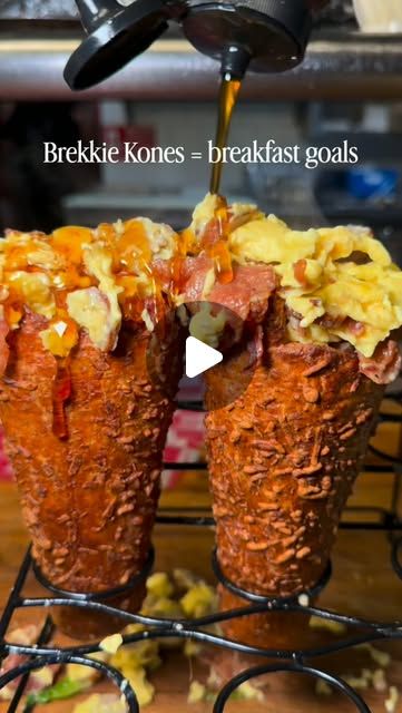 Breakfast BreadKones with scrambled eggs and bacon getting a maple drizzle
